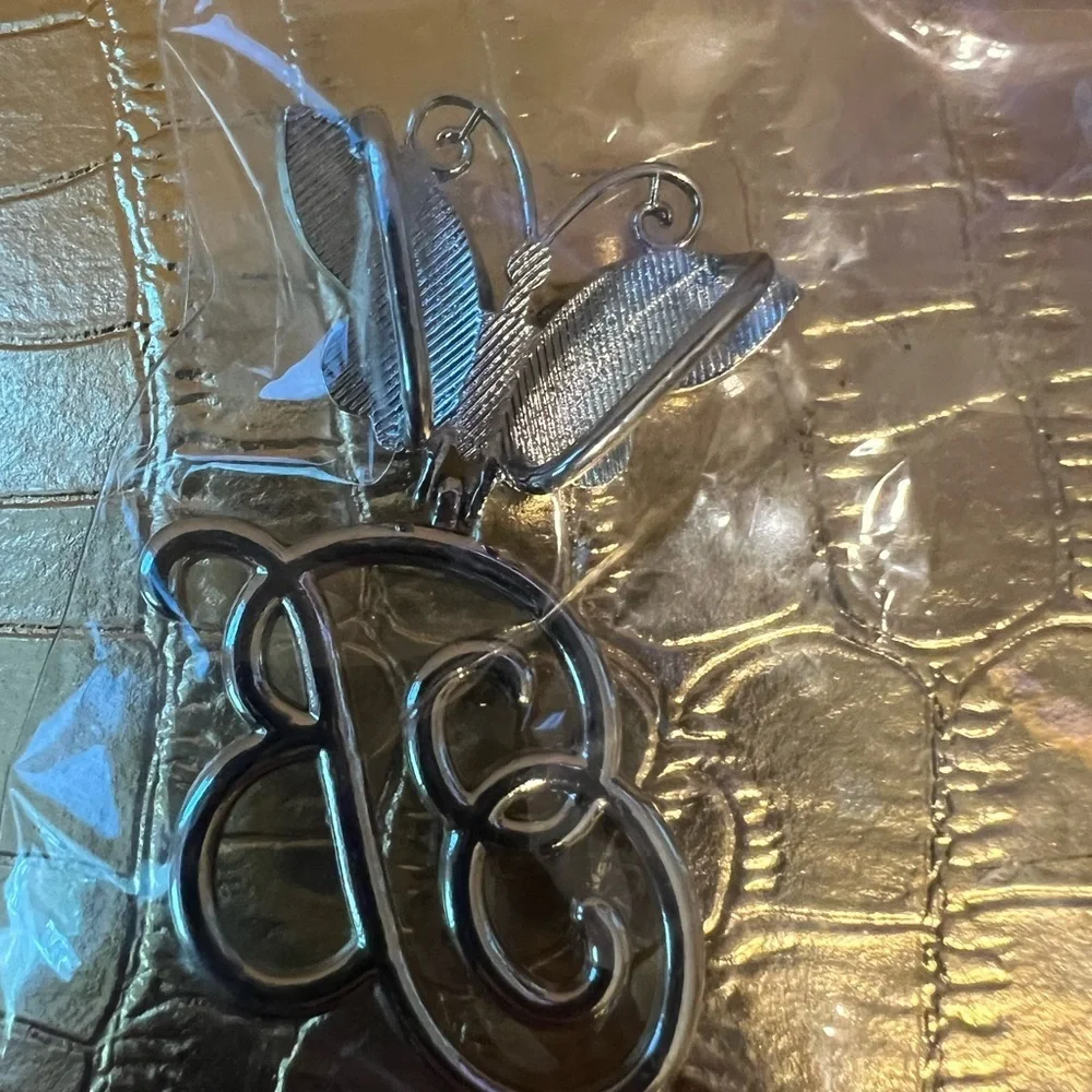 Elegant Silver “B” Butterfly Pendant